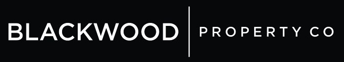 Partial view of a black banner with white text and a vertical divider.
